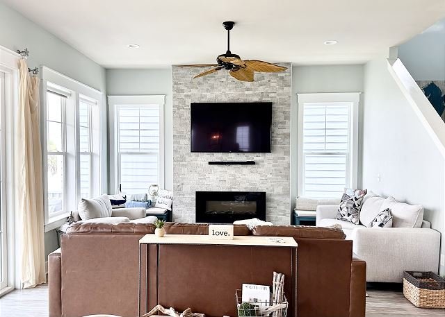 Open great room with stone fireplace