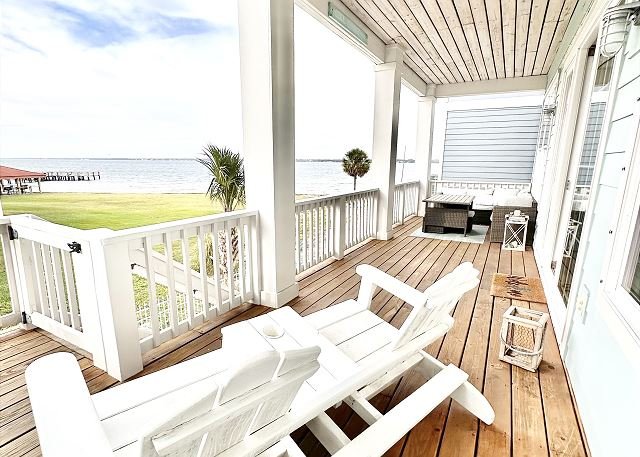 Covered porch and gate to the Sound beach